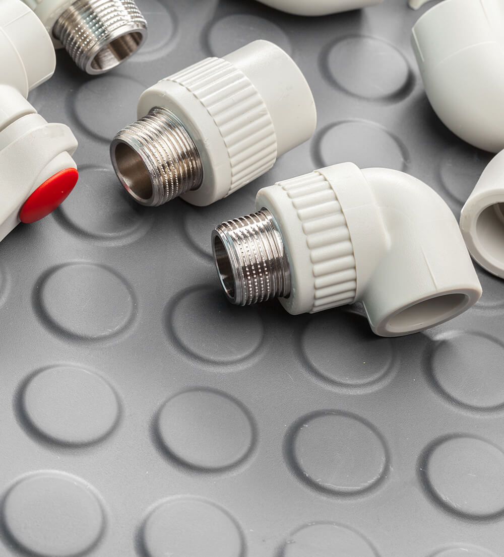 Plastic parts for bathroom fixtures